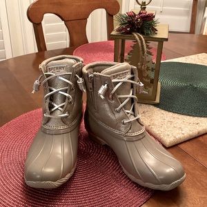 New never worn Sperry boots.